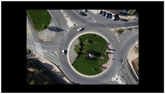 Vista desde lo alto de un edificio
Descripción generada automáticamente con confianza baja